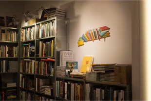 view of Scriptum Art Books stand at TEFAF, with painting 'Verbal Painting' by Paul Critchley