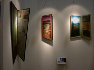 Stand view, paintings by Paul Critchley at art miam 2003 with Portals Ltd gallery