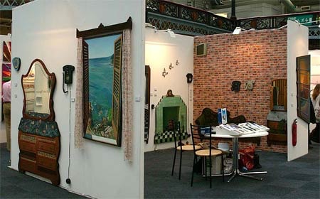 view of stand with paintings by Paul Critchley